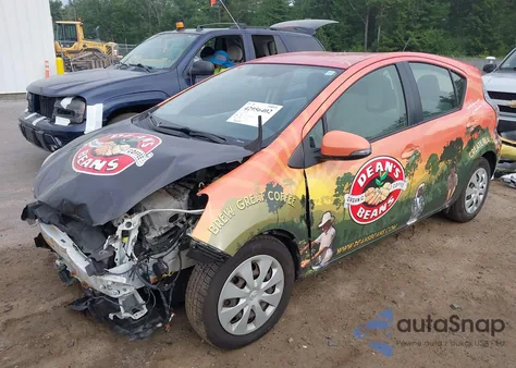 2014 Toyota Prius C One z USA, uszkodzony, nr VIN JTDKDTB37E1569922